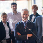 senior business man with his team at office