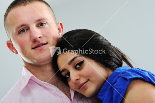 Portrait of a beautiful young happy smiling couple