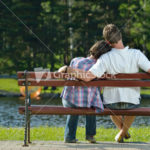 Portrait of romantic young couple smiling together outdoor