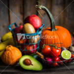 Fruits and vegetables on wooden background
