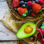 Fruits and vegetables on rustic background