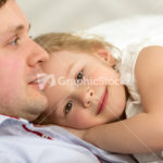 Lovely girl close to beloved father
