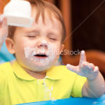Little boy crying with face got dirty