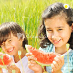 Eating watermelon outside