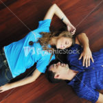 happy couple in empty apartment