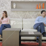 couple relax at home on sofa in living room