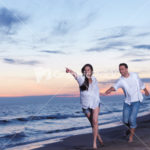 young couple  on beach have fun