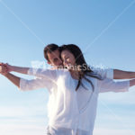 young couple  on beach have fun