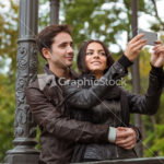 Beautiful couple making selfie photo