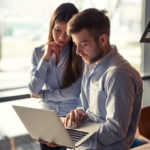 Free couple with laptop