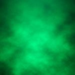 Green spotlight smoke background.